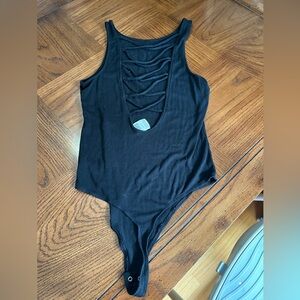 Pink Victoria’s Secret bodysuit